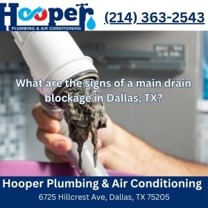 What are the signs of a main drain blockage in Dallas, TX?